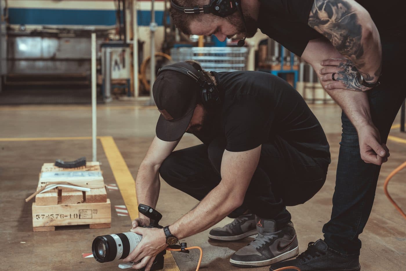 Hyped Visuals crew setting up a cinema camera rig on location before a shoot
