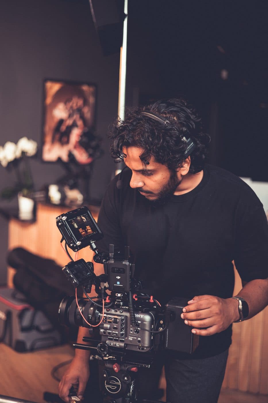 A Hyped Visuals camera operator monitoring a cinema camera during production