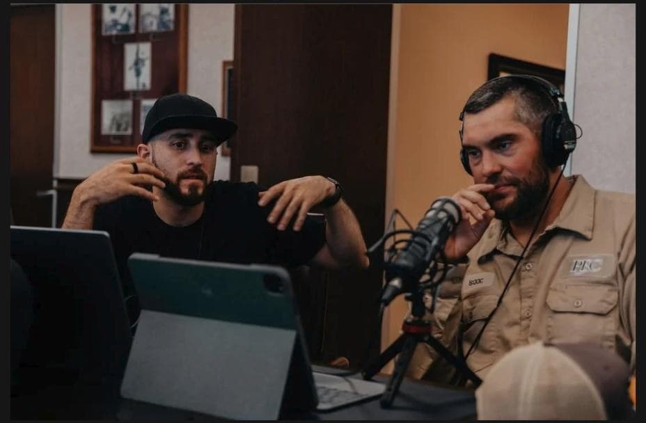 A Hyped Visuals director and a People's Electric Cooperative lineman during his on-camera interview