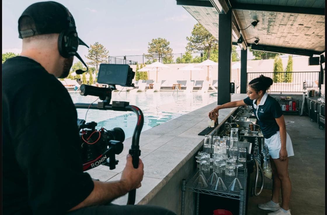 Hyped Visuals filming poolside lifestyle content at Rose Creek Country Club in Edmond, Oklahoma